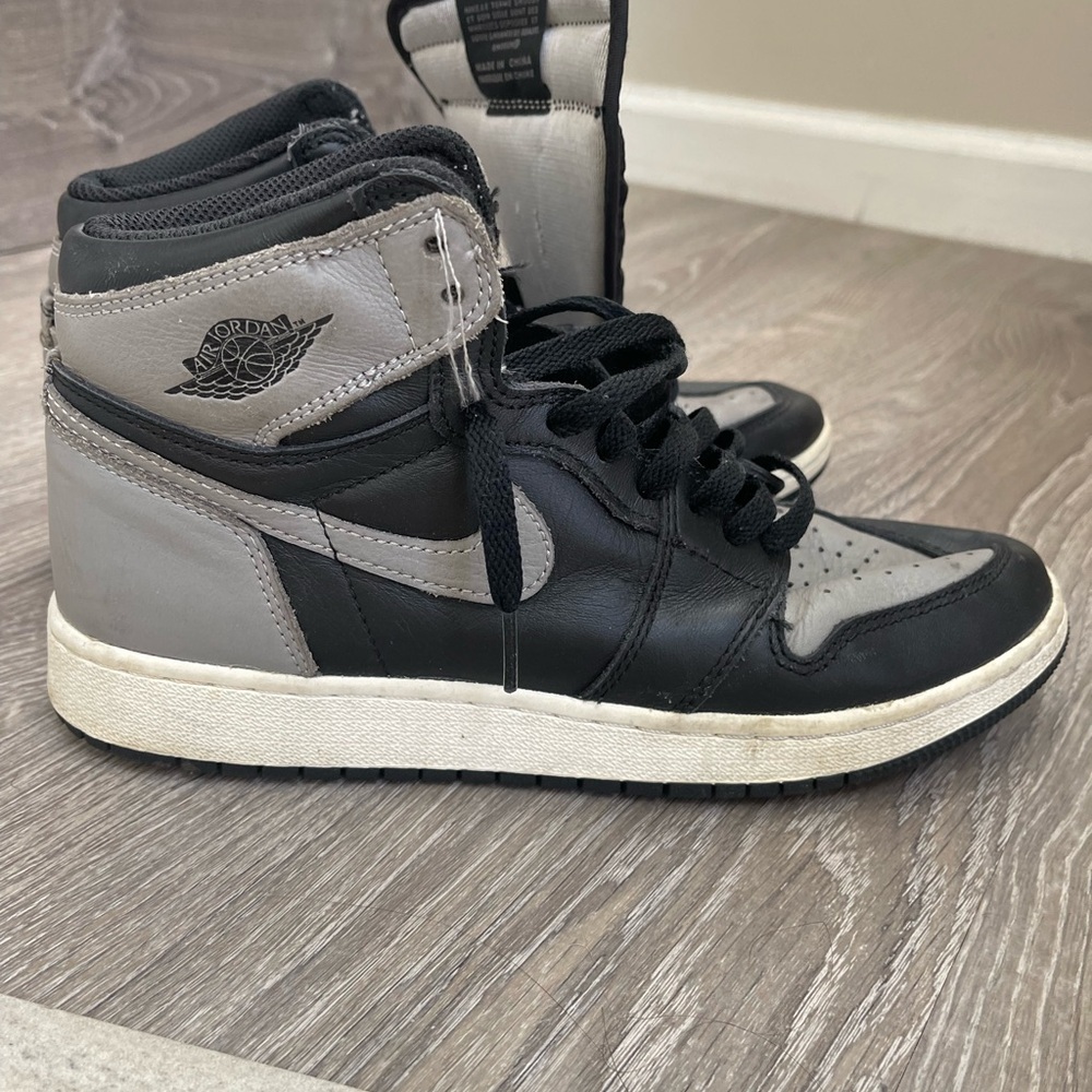 Nike Air Jordan 1 Retro. Black and grey. 7Y
